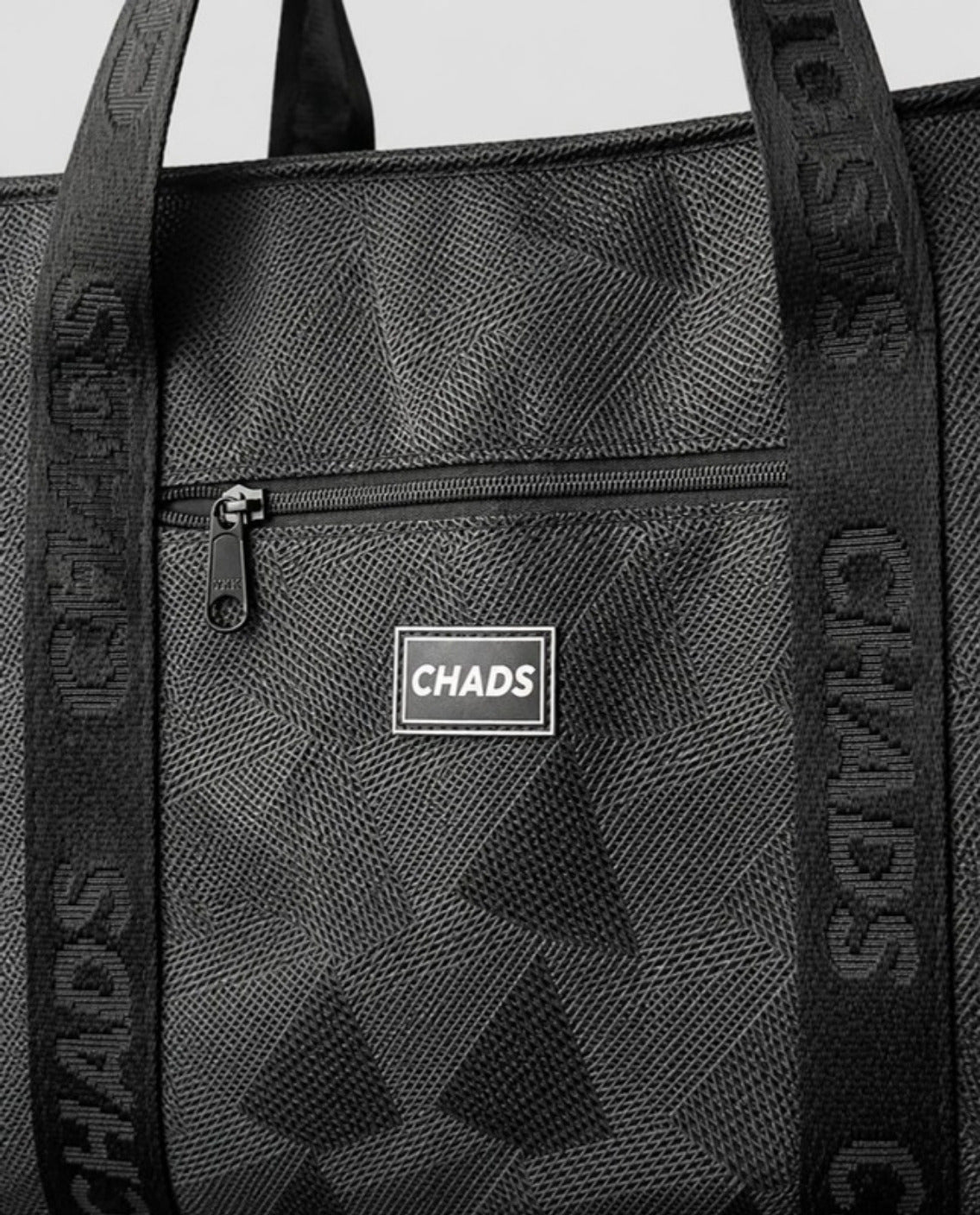 Detalle del logo CHADS y la tela del tote